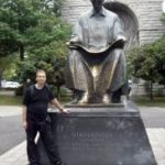 andrew_hennessey_in_front_of_tesla_statue